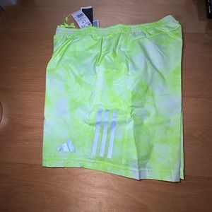 Adidas men Sz L 7” running shorts New with tags
